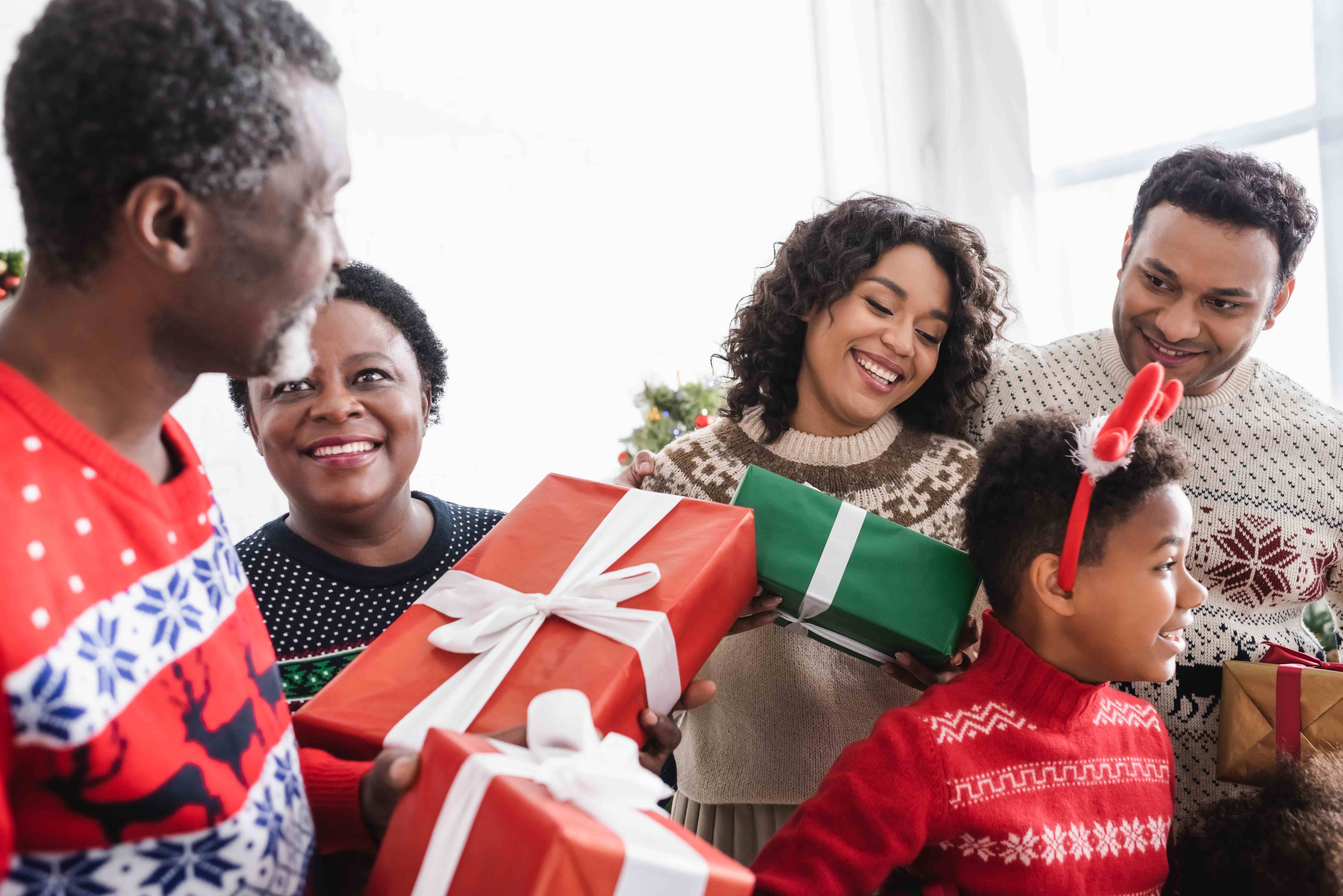 Family enjoying gifts with help from skip a pay. 