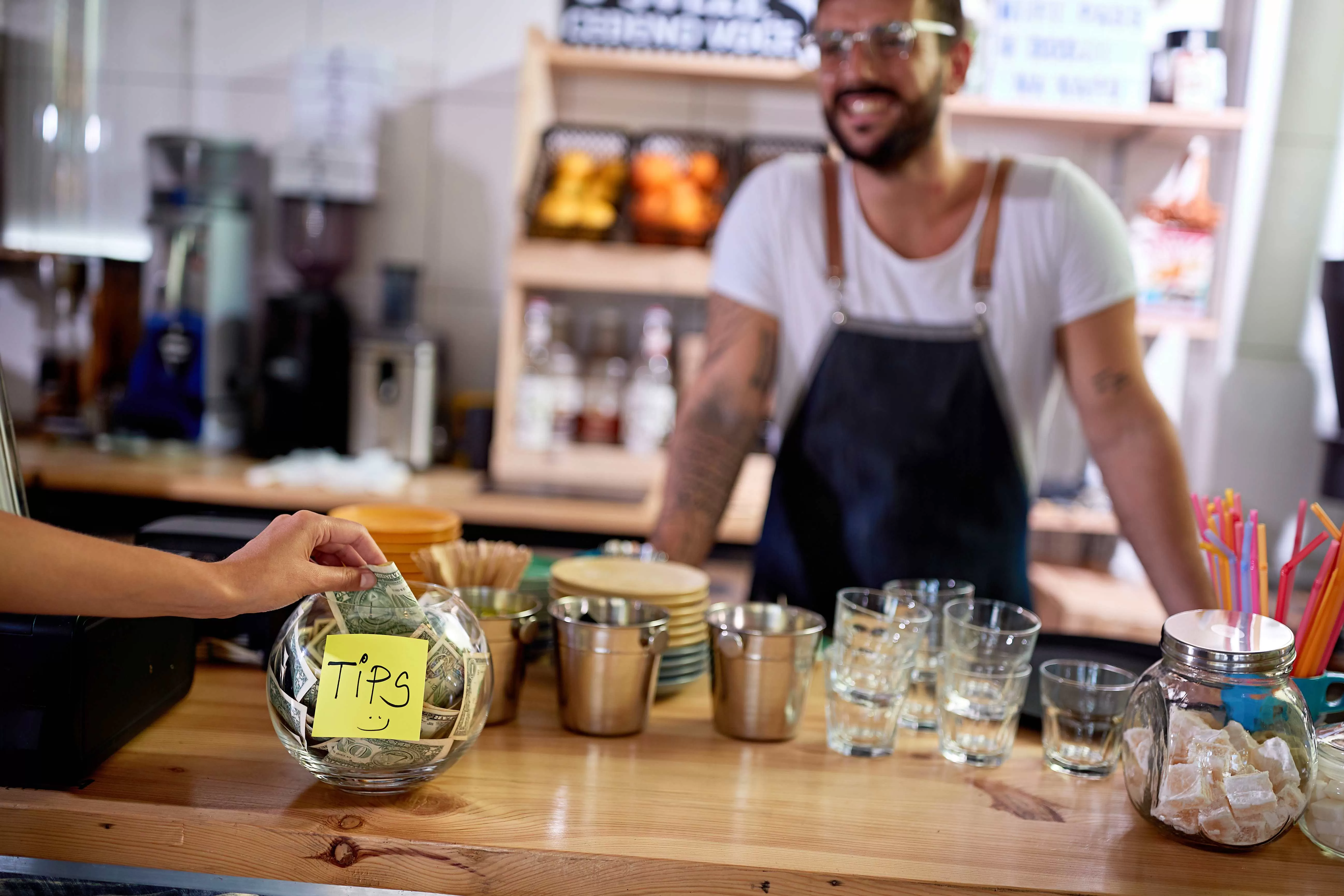 Tipping jar on coffee shop counter