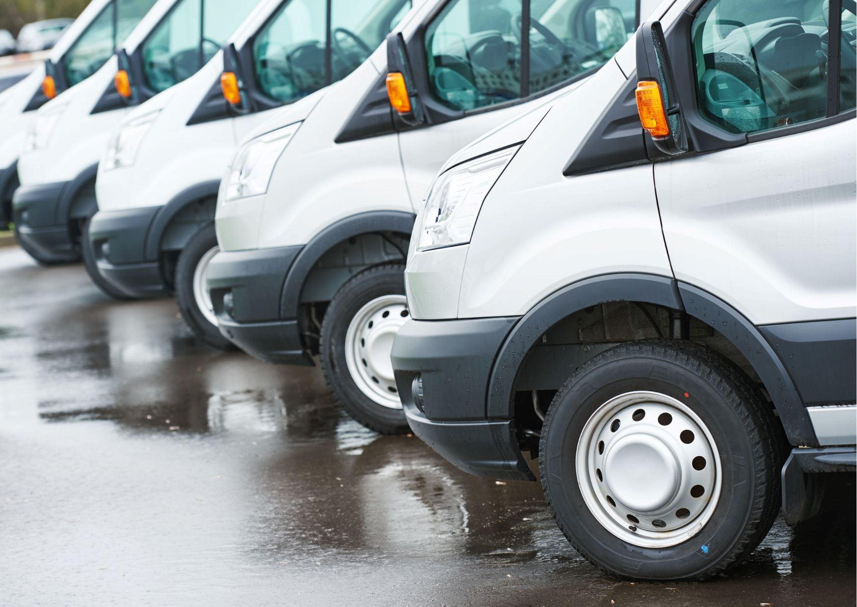 Fleet of vans lined up. SCU can help you with your fleet financing needs.